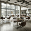 Durable circular discussion tables designed for higher education facilities, featuring open-base metal frames and wood finishes