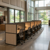 Modular library study carrel cluster with sound-absorbing panels and ergonomic office chairs
