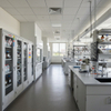 Vented steel laboratory cabinet with GHS safety labels for chemical reagent storage in university lab