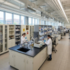 Durable steel lab lockers and central island benches in a modern university chemistry laboratory