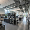 Integrated Glass Front Storage Cabinet and island workstations for higher education labs