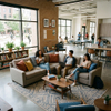 Large U-shaped student housing common room sofa with students studying around a central wooden coffee table