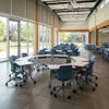 Ergonomic mobile seating and mobile desks featuring smooth-rolling locking casters designed for dynamic K-12 and university spaces