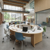 Semicircular round library desk configuration with laptops and colorful chairs in an open university space.